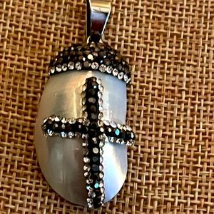 Shell pendant with hematite and clear color crystal with criss cross in black